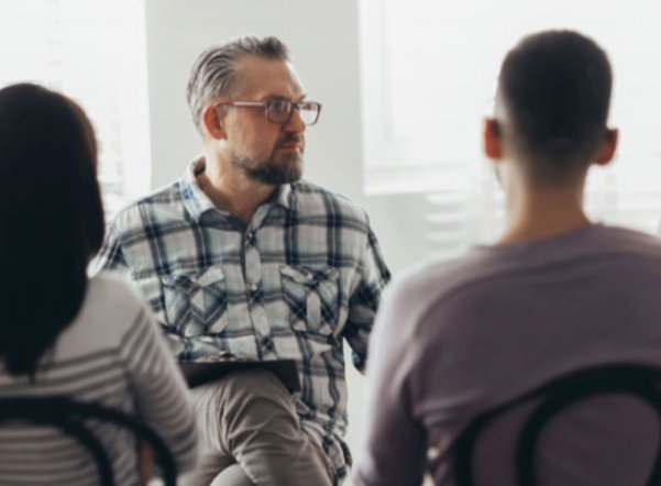 man leading counseling session
